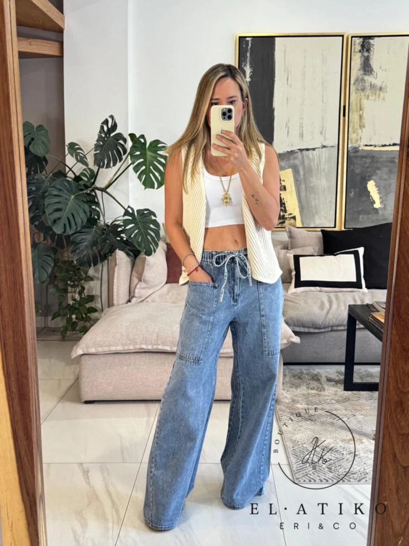 Jeans de mezclilla con jareta y bolsas